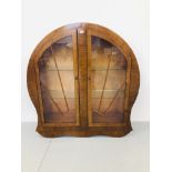 1030'S SUNBURST OAK FINISH TWO DOOR DISPLAY CABINET HEIGHT 50.