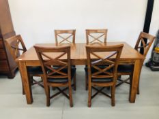 A HARDWOOD EXTENDING DINING SET COMPRISING EXTENDING TABLE 71 INCH X 36 INCH (91 INCH EXTENDED) AND