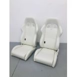 A PAIR OF RACELAND CAR SETS IN WHITE