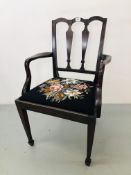 A MAHOGANY OPEN ELBOW CHAIR WITH FLORAL NEEDLE CRAFT SEAT