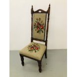 A ROSEWOOD NURSING CHAIR WITH FLORAL NEEDLE CRAFT UPHOLSTERED SEAT AND BACK