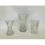 A LARGE HEAVY FLUTED LEAD CRYSTAL VASE HEIGHT 12 INCH ALONG WITH A WAISTED LEAD CRYSTAL VASE HEIGHT