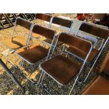 A SET OF SIX RETRO CHROME FRAMED FOLDING CHAIRS PLUS AN ALUMINIUM FRAMED TILE TOP COFFEE TABLE