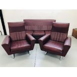 A PAIR OF 1960'S BURGUNDY REXINE UPHOLSTERED EASY CHAIRS ON CHROME BASE AND A THREE SEATER BURGUNDY