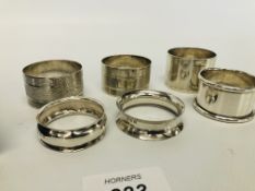 COLLECTION OF 6 SILVER SERVIETTE RINGS + PAIR OF CASED SILVER ENGRAVED SERVIETTE RINGS