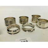 COLLECTION OF 6 SILVER SERVIETTE RINGS + PAIR OF CASED SILVER ENGRAVED SERVIETTE RINGS