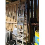 A SET OF SEVEN TREAD ALUMINIUM STEPS AND A BLACK & DECKER THREE WAY LADDER