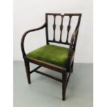 A PERIOD MAHOGANY ELBOW CHAIR WITH GREEN VELOUR UPHOLSTERED SEAT