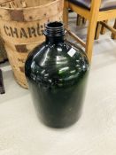 LARGE VINTAGE GREEN GLASS BOTTLE IN ORIGINAL WOODEN BANDED STORAGE CONTAINER "CHARGED 32' RETURN