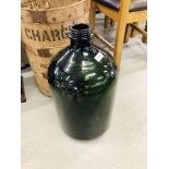 LARGE VINTAGE GREEN GLASS BOTTLE IN ORIGINAL WOODEN BANDED STORAGE CONTAINER "CHARGED 32' RETURN