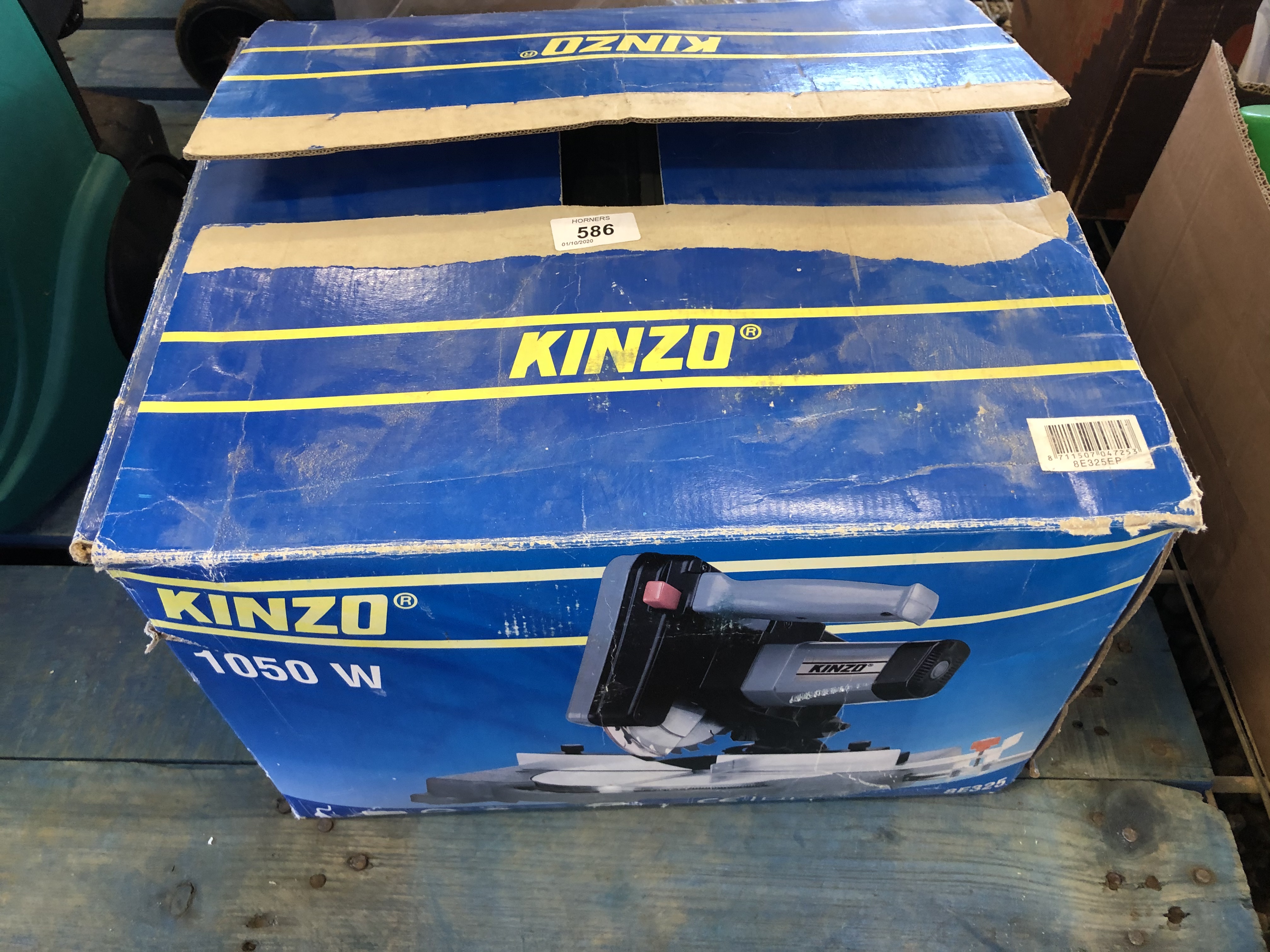 A KINZO 1050 WATT CUT OFF SAW WITH INSTRUCTIONS - SOLD AS SEEN