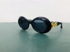 A PAIR OF DESIGNER SUNGLASSES MARKED GIANNI VERSACE MODEL 418/C