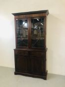 A REPRODUCTION MAHOGANY FINISH ASTRAGAL GLAZED BOOKCASE STANDING ON TWO DRAWER CABINET BASE -