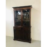 A REPRODUCTION MAHOGANY FINISH ASTRAGAL GLAZED BOOKCASE STANDING ON TWO DRAWER CABINET BASE -