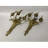 A PAIR OF HIGHLY DECORATED BRASSED 3 BRANCH WALL LIGHT FITTINGS - REQUIRE INSTALLATION BY QUALIFIED