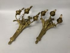 A PAIR OF HIGHLY DECORATED BRASSED 3 BRANCH WALL LIGHT FITTINGS - REQUIRE INSTALLATION BY QUALIFIED