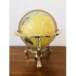 LARGE POLISHED GEM STONE GLOBE IN BRASSED GIMBLE MOUNT - DIAMETER 12 INCH