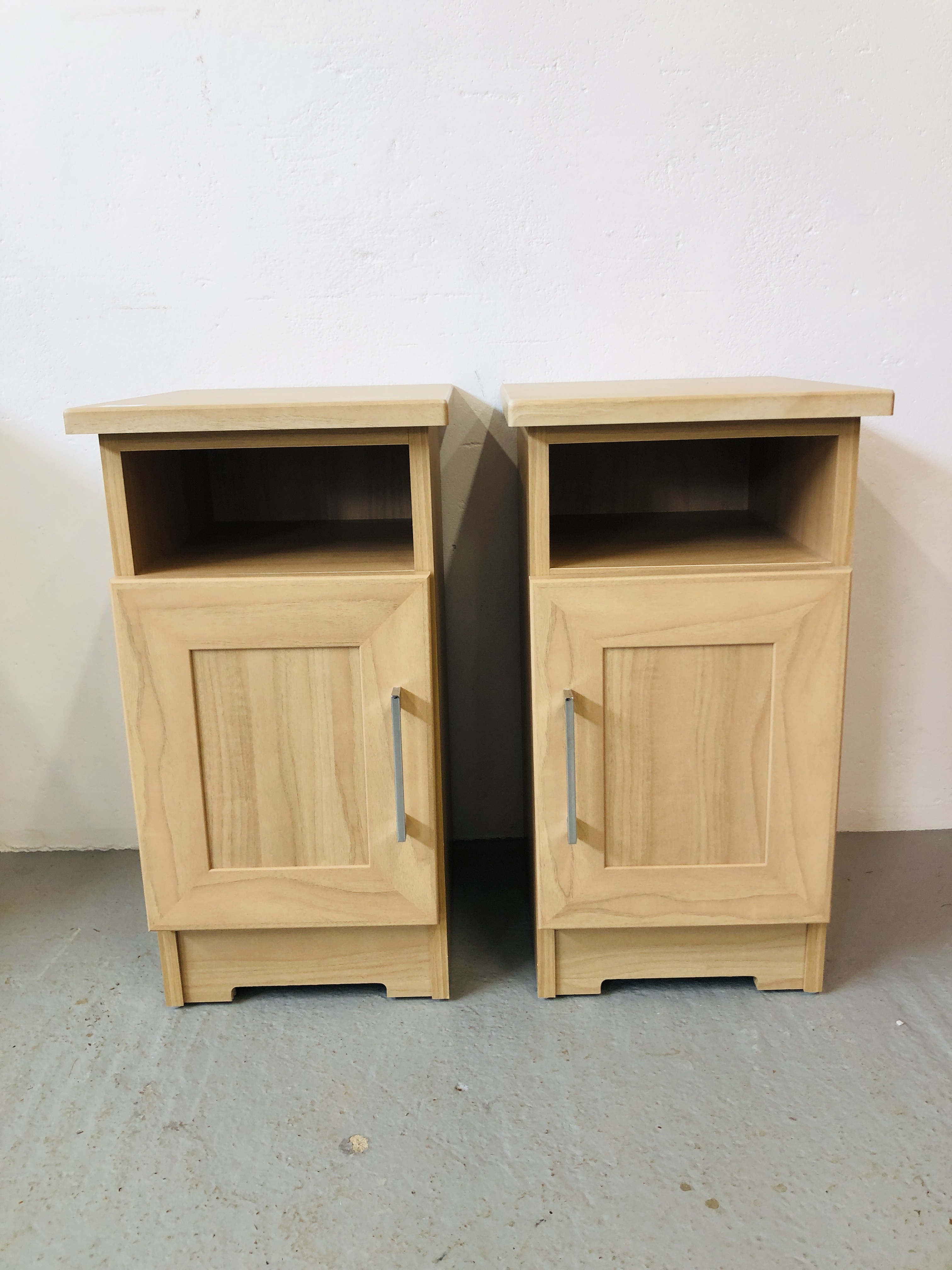 PAIR OF MODERN LIMED FINISH SINGLE DOOR BEDSIDE CABINETS