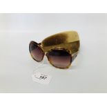 PAIR OF DESIGNER SUNGLASSES MARKED "MIU MIU" WITH CASE