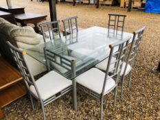 A DESIGNER GLASS TOP DINING SET COMPRISING OF TABLE AND SIX CHAIRS