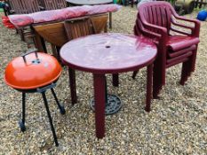 A BURGUNDY UPVC GARDEN TABLE AND FOUR MATCHING CHAIRS PLUS CAST IRON PARASOL STAND AND SMALL