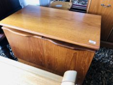 A G-PLAN STYLE TEAK FINISH TWO DOOR CABINET AND A RETRO STYLE TWO TIER TEAK FINISH COFFEE TABLE + A