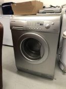 A SAMSUNG SILVER FINISH WASHING MACHINE 7KG MODEL J1453S - SOLD AS SEEN