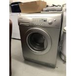 A SAMSUNG SILVER FINISH WASHING MACHINE 7KG MODEL J1453S - SOLD AS SEEN