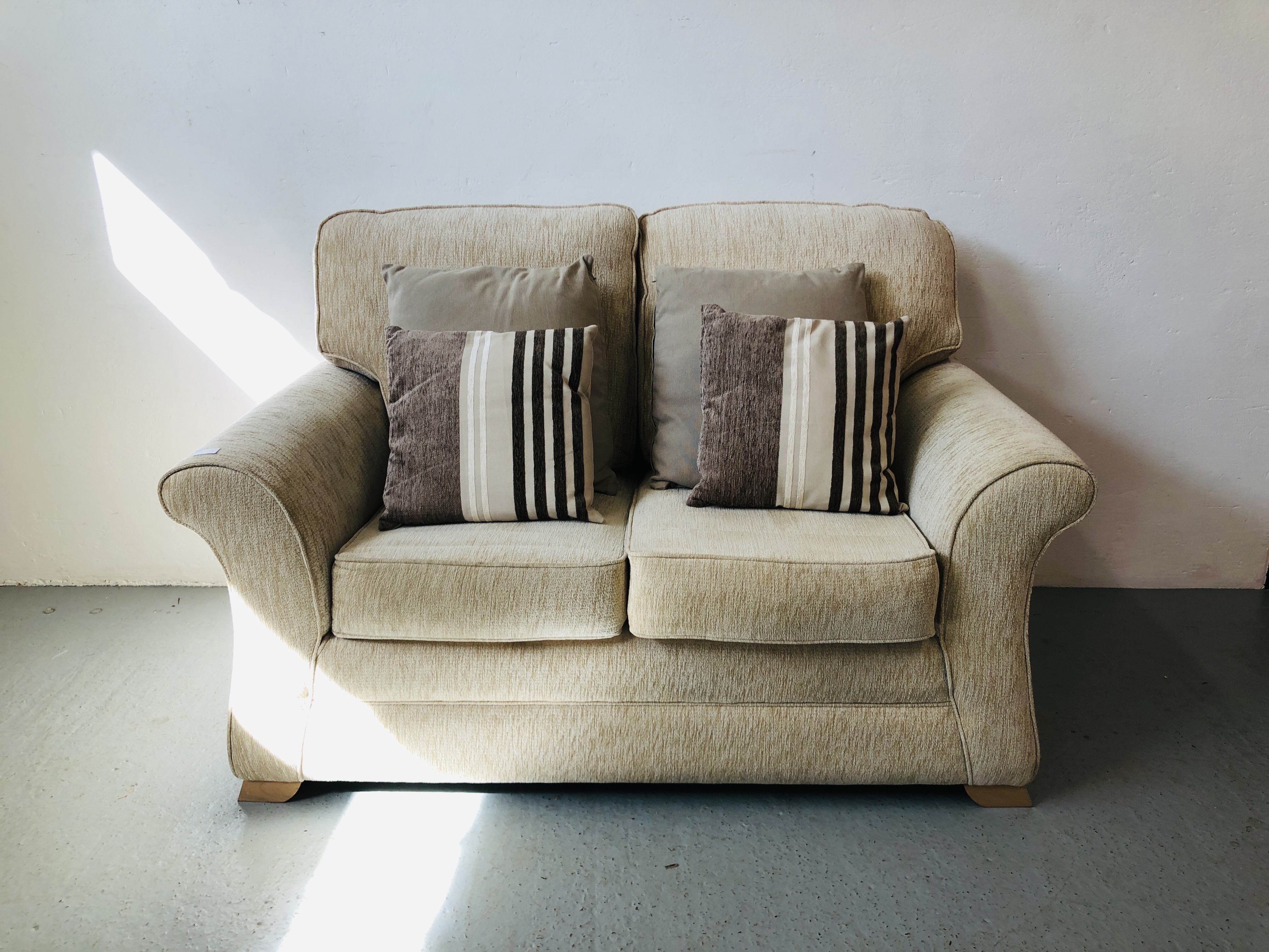 MODERN 2 SEATER CREAM UPHOLSTERED SOFA