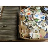 TWO LARGE BOXES OF STAMPS IN ALBUMS AND LOOSE,