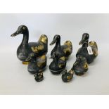 SET OF 8 GRADUATED PEWTER DUCKS WITH INSET BRASS DETAIL