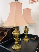 A PAIR OF IMPRESONE BRASSED TABLE LAMPS WITH PINK SHADES AND A PAIR OF JOHN LEWIS TABLE LAMPS -