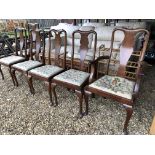 A SET OF SIX MAHOGANY QUEEN ANNE STYLE DINING CHAIRS WITH EMBROIDED STUFF OVER SEATS (SOME