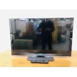 A PANASONIC 37 INCH VIERA TELEVISION COMPLETE WITH REMOTE - SOLD AS SEEN