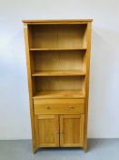 A HONEY PINE FULL HEIGHT BOOKSHELF WITH DRAWER AND CABINET TO BASE WIDTH 32 INCH HEIGHT 72 INCH