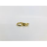 A DOUBLE INTERLOCKED BAND RING WITH HEART PENDANTS MARKED 750