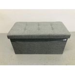 A MODERN GREY UPHOLSTERED STOOL