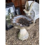 A STONEWORK GARDEN BIRD BATH