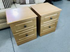 A PAIR OF MODERN THREE DRAWER LIMED FINISH BEDSIDE CHESTS