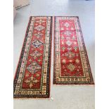 2 X RED PATTERNED EASTERN HALL RUNNERS 200CM. X 60CM. AND 180CM. X 65CM.