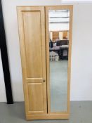 A MODERN TWO DOOR LIMED FINISH WARDROBE WITH MIRROR TO ONE DOOR WIDTH 80CM. HEIGHT 192CM.