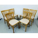 A SET OF SIX BEECHWOOD KITCHEN CHAIRS