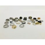 A BAG CONTAINING 30 VARIOUS DESIGNER COSTUME JEWELLERY RINGS TO INCL. MARKED CALVIN KLEIN.