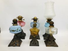 6 X VINTAGE DECORATIVE METAL BASED OIL LAMPS WITH VARYING COLOURED GLASS FONTS + ART NOUVEAU CLEAR