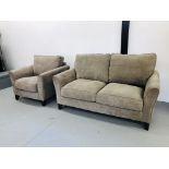 A MODERN TWO PIECE LOUNGE SUITE COMPRISING OF TWO SEATER SOFA AND SINGLE CHAIR UPHOLSTERED IN LIGHT
