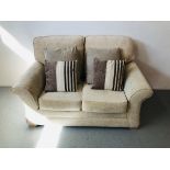 MODERN 2 SEATER CREAM UPHOLSTERED SOFA