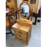 HONEY PINE THREE DRAWER BEDSIDE CHEST AND HONEY PINE VANITY MIRROR WITH HINGED JEWELLERY