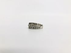 A DESIGNER WHITE GOLD DIAMOND RING MARKED 18CT,