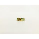 A DESIGNER EMERALD AND DIAMOND SET RING THE SHANK MARKED 18K
