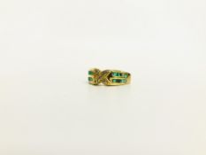 A DESIGNER EMERALD AND DIAMOND SET RING THE SHANK MARKED 18K